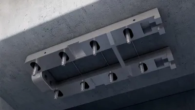 Sistema de pretensado de placas de CFRP pretensadas